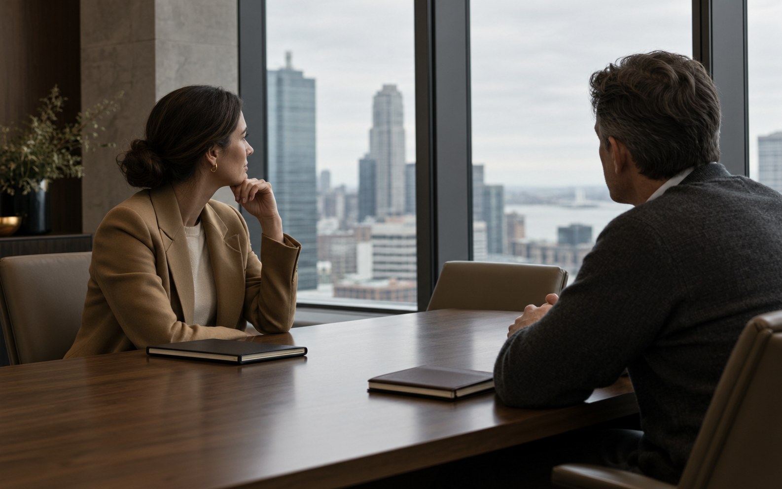 Consultants in conversation in a Boston financial district meeting room